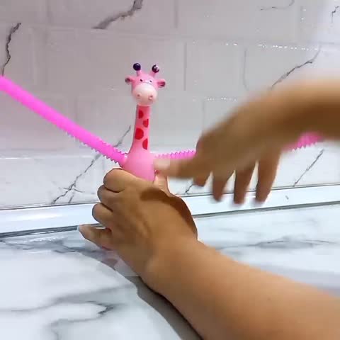 اسباب بازی زرافه فنری چسبناکی قد 20 سانتی متری چسبونکی کششی لوله حسی فیجت مناسب سرگرمی کودک در سفر مسافرت، دست ورزی